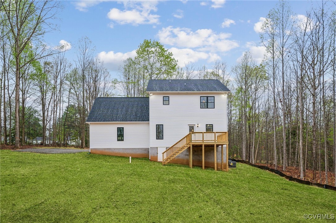 2467 Judes Ferry Road Powhatan, VA 23139 - Photo 36 of 36 a view of a house with backyard