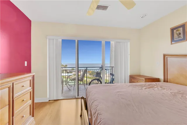 a view of a living room and entryway