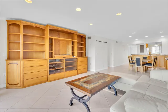 a bathroom with a toilet and shower