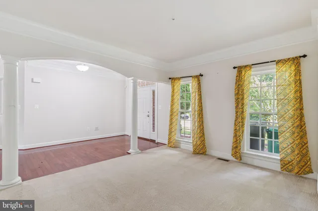 an empty room with windows