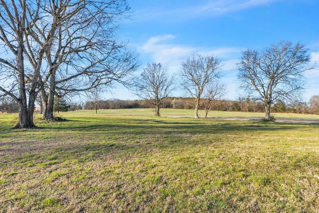 a view of an swimming pool with an ocean view