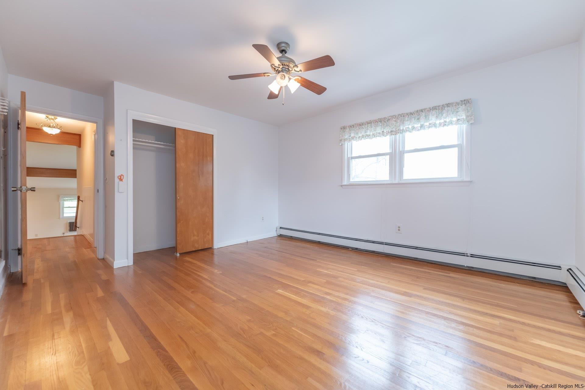 2 Magic Drive Kingston, NY 12401 - Photo 17 of 27 an empty room with wooden floor and windows