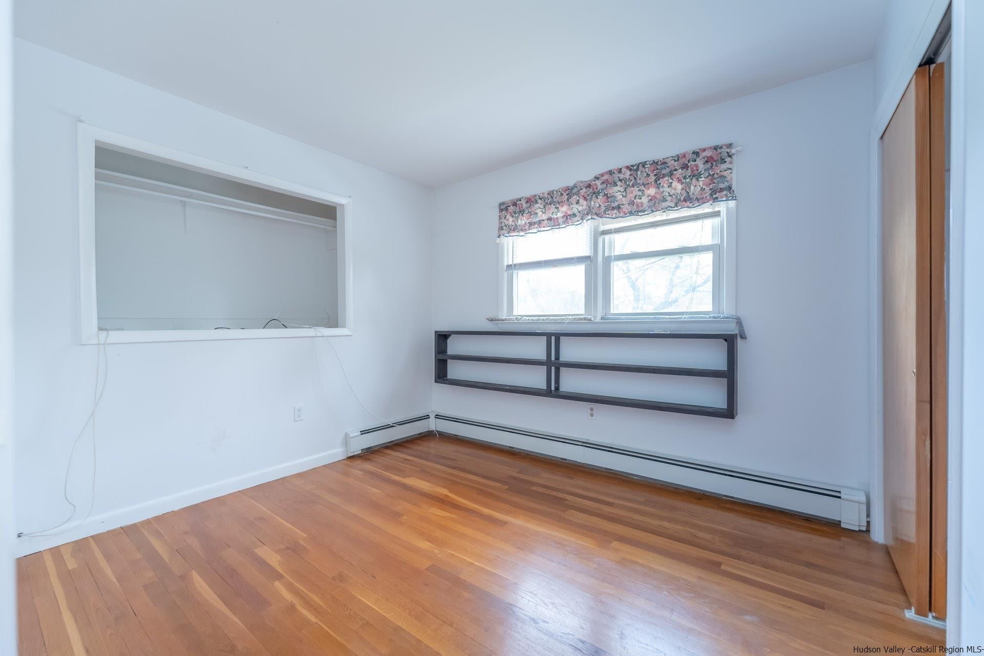 2 Magic Drive Kingston, NY 12401 - Photo 19 of 27 a view of empty room with wooden floor and fan