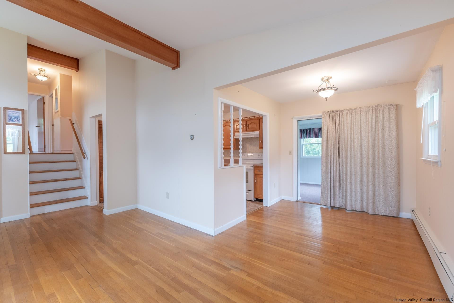 2 Magic Drive Kingston, NY 12401 - Photo 4 of 27 a view of a livingroom with wooden floor and stairs