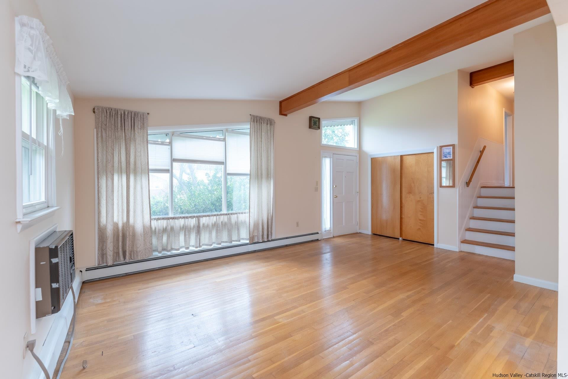 2 Magic Drive Kingston, NY 12401 - Photo 7 of 27 an empty room with wooden floor and entryway