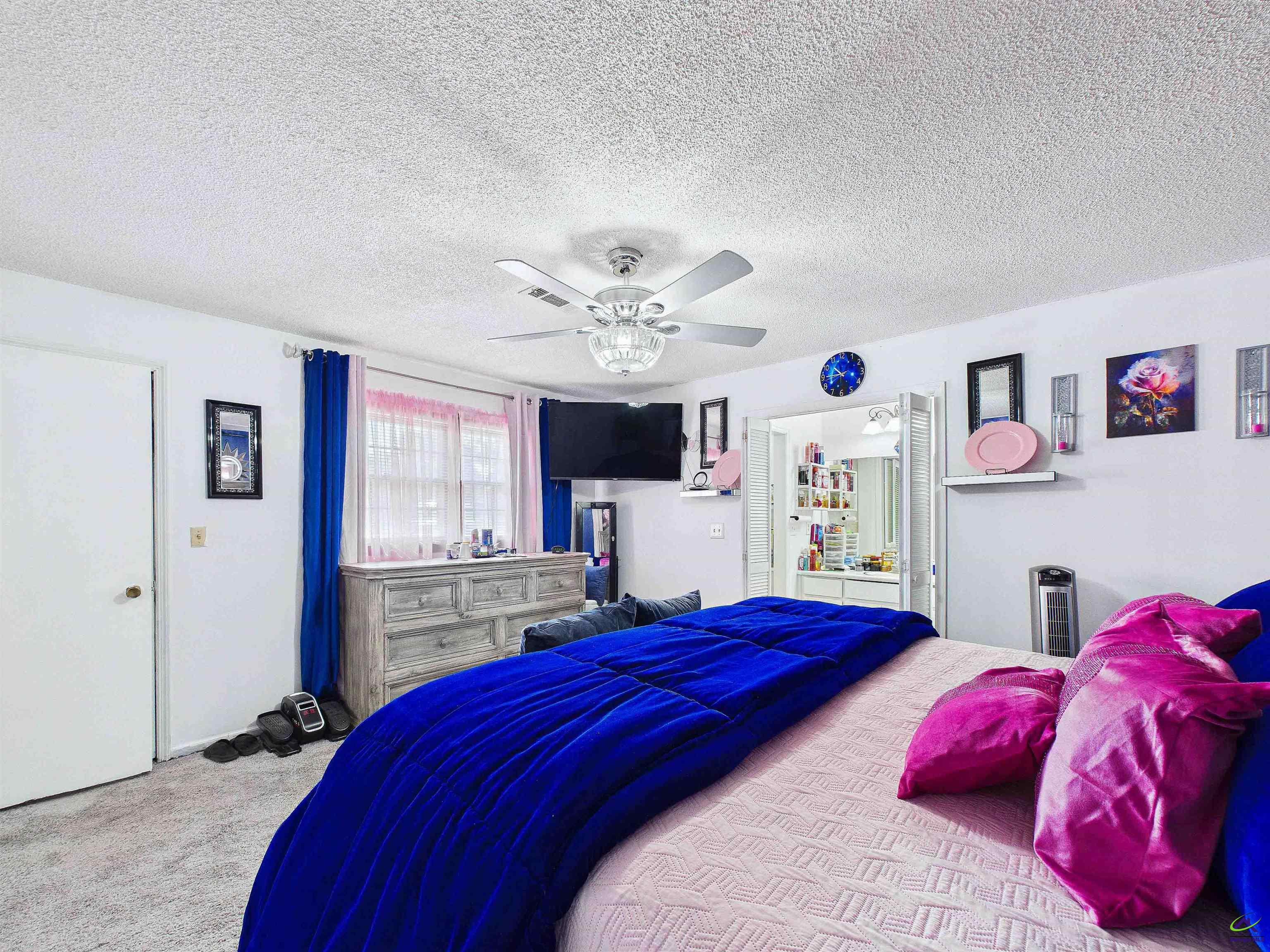 400 Feagin Mill Road Warner Robins, GA 31005 - Photo 37 of 53 a bedroom with a large bed and a window