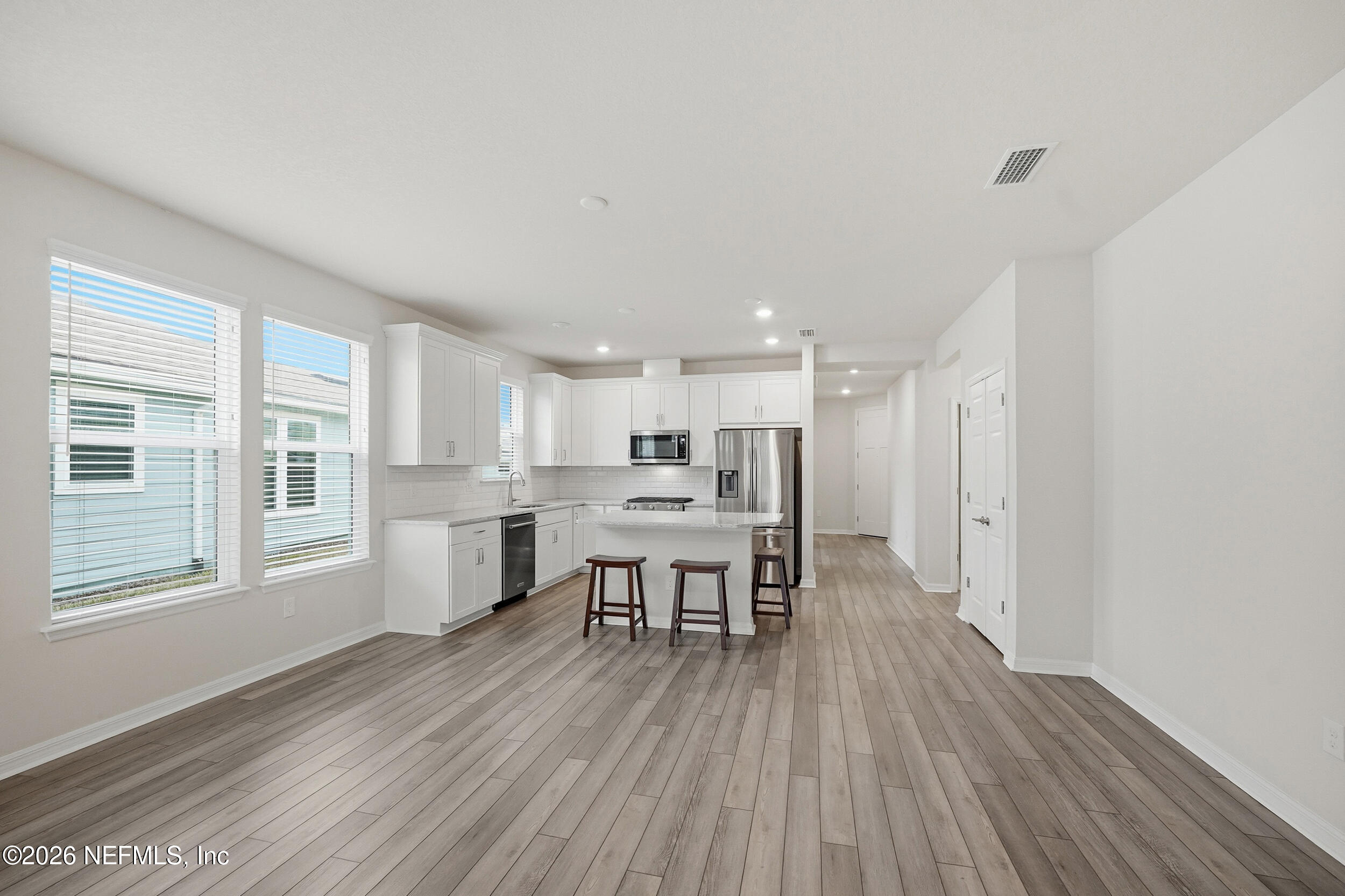 73 Curved Bay Trail Ponte Vedra, FL 32081 - Photo 10 of 41 Family Rm to Kitchen