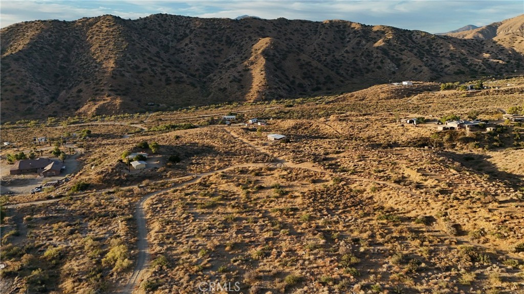 49680 Oskar Lane Morongo Valley, CA 92256 - Photo 4 of 10 a view of a covered with snow on the road