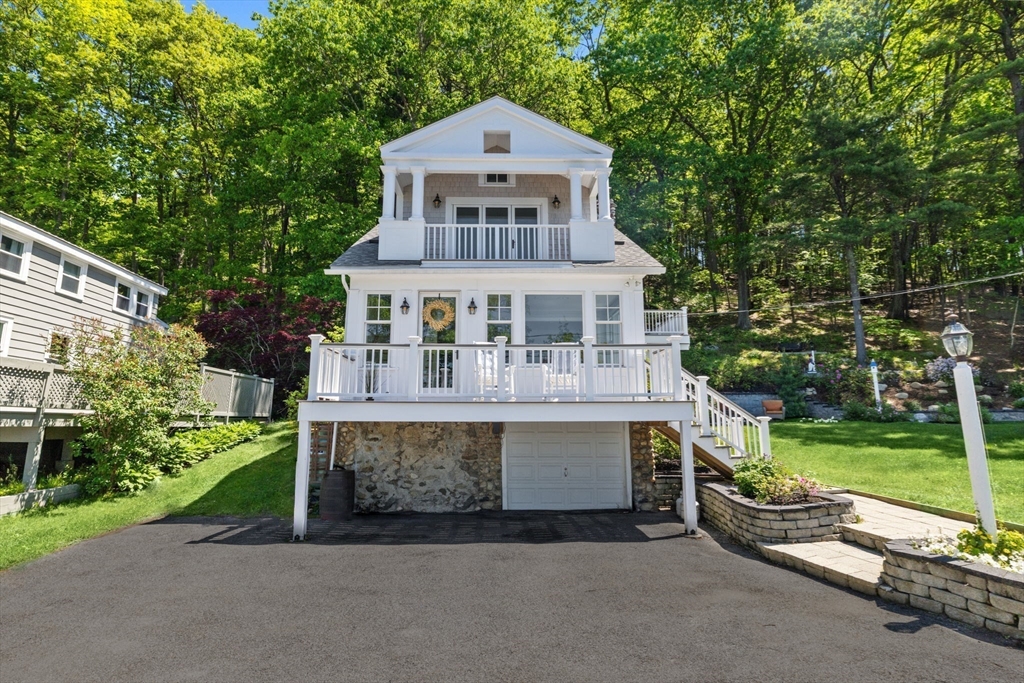 35 Keyes Road Westford, MA 01886 - Photo 40 of 40 a front view of a house with a yard