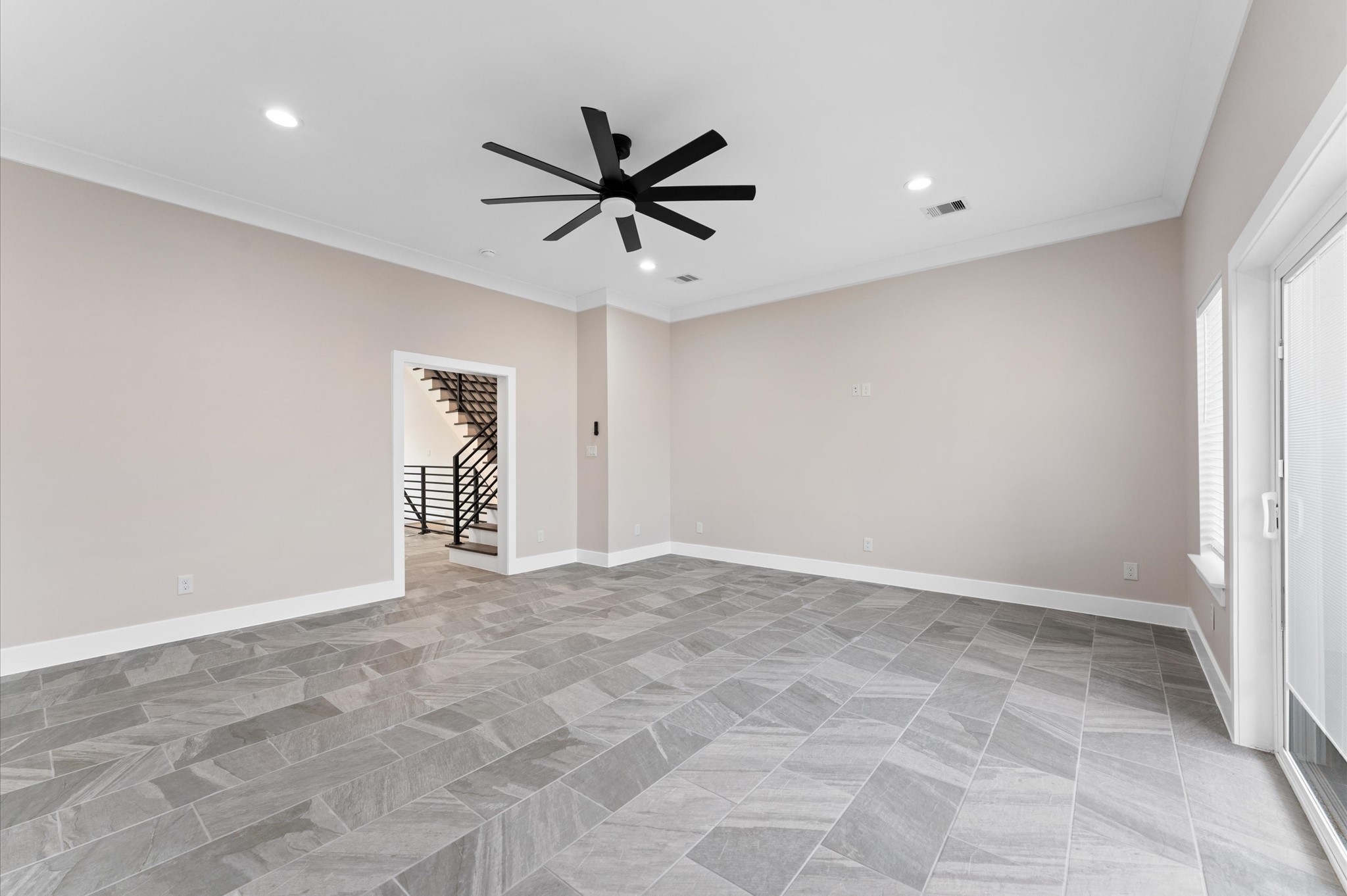1906 Dismuke Street, Unit B Houston, TX 77023 - Photo 23 of 42 a view of a livingroom with a ceiling fan and window