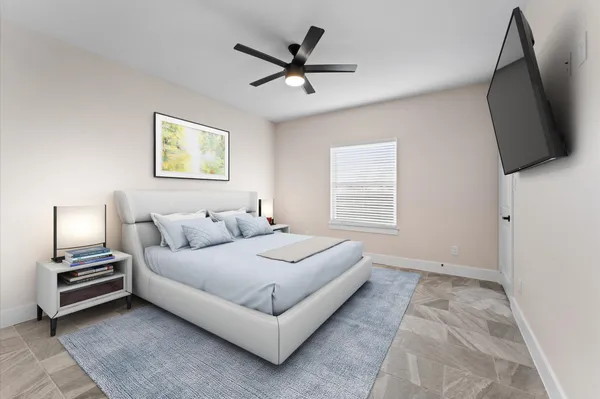 a bathroom with a sink a toilet a mirror and bathtub