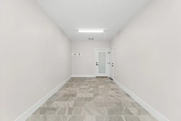 a workspace with furniture and window