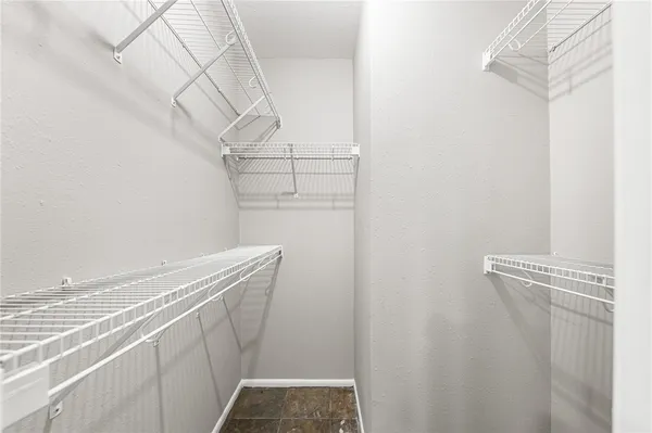 a view of a room with racks on the wall