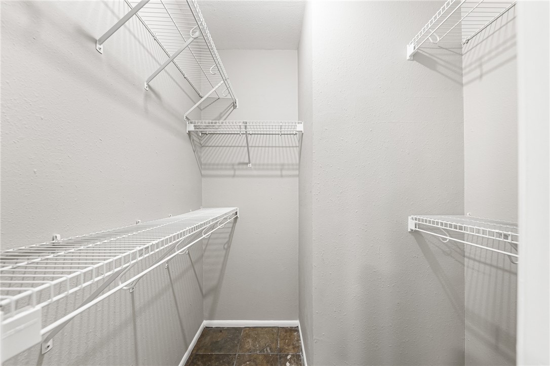 5038 Crestwick Drive Corpus Christi, TX 78413 - Photo 14 of 28 a view of a room with racks on the wall