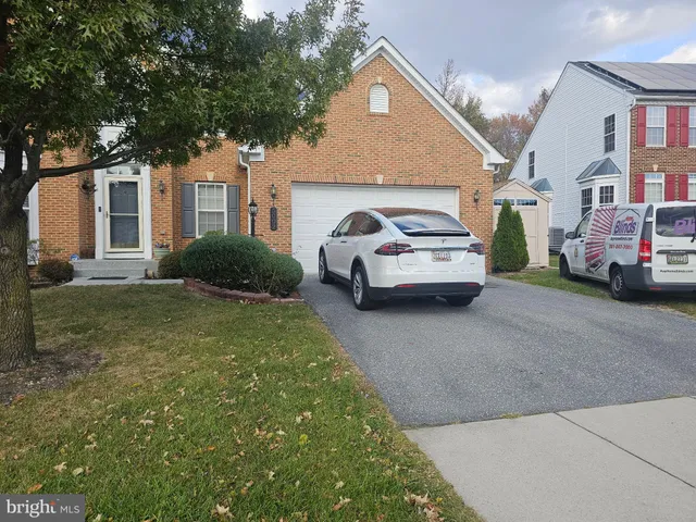 a car parked in front of a house