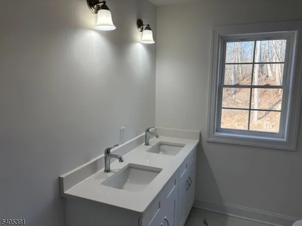 a bathroom with a sink and a vanity