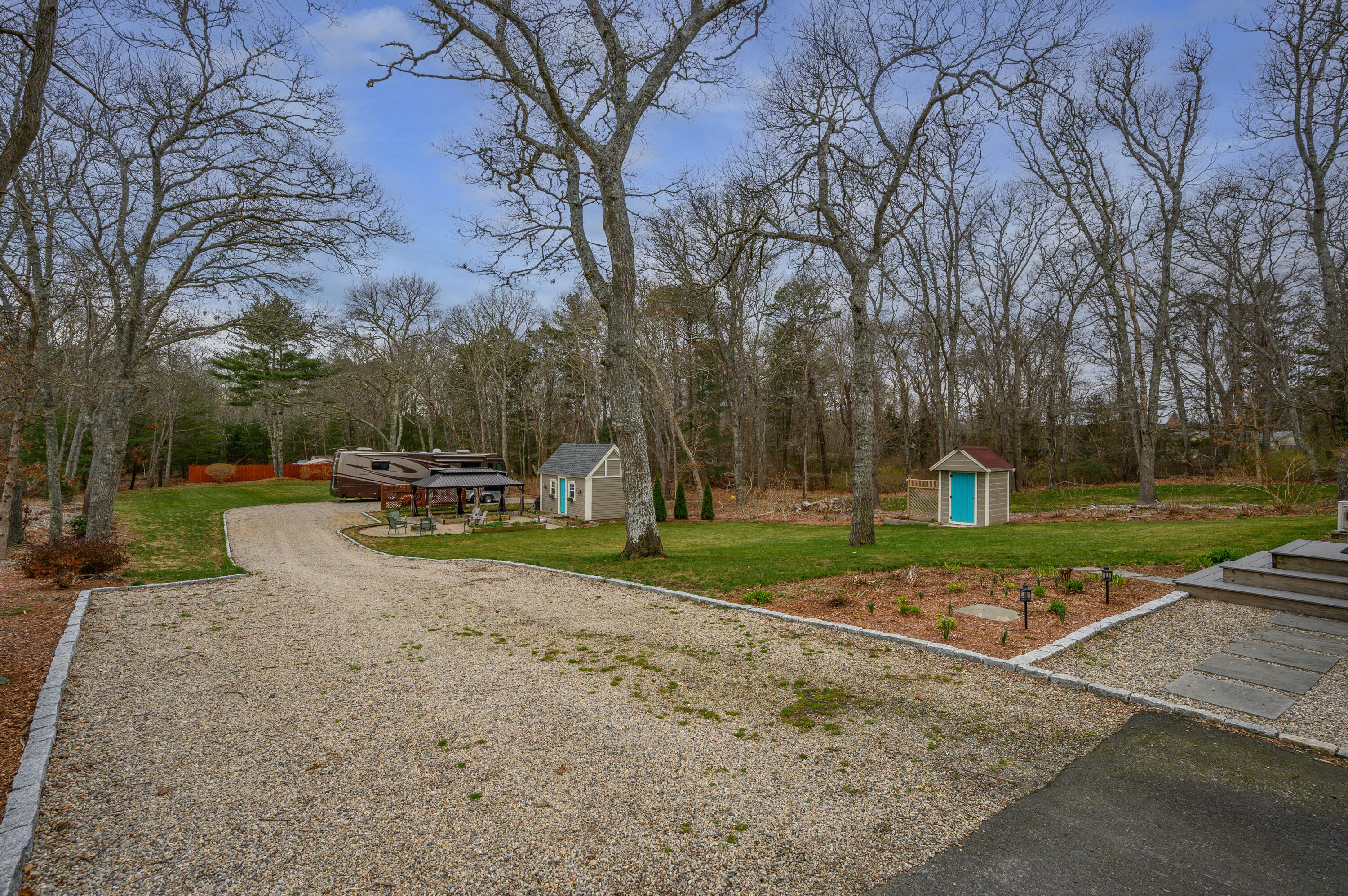 2045 Main Street Marstons Mills, MA 02648 - Photo 28 of 41 Back yard from driveway