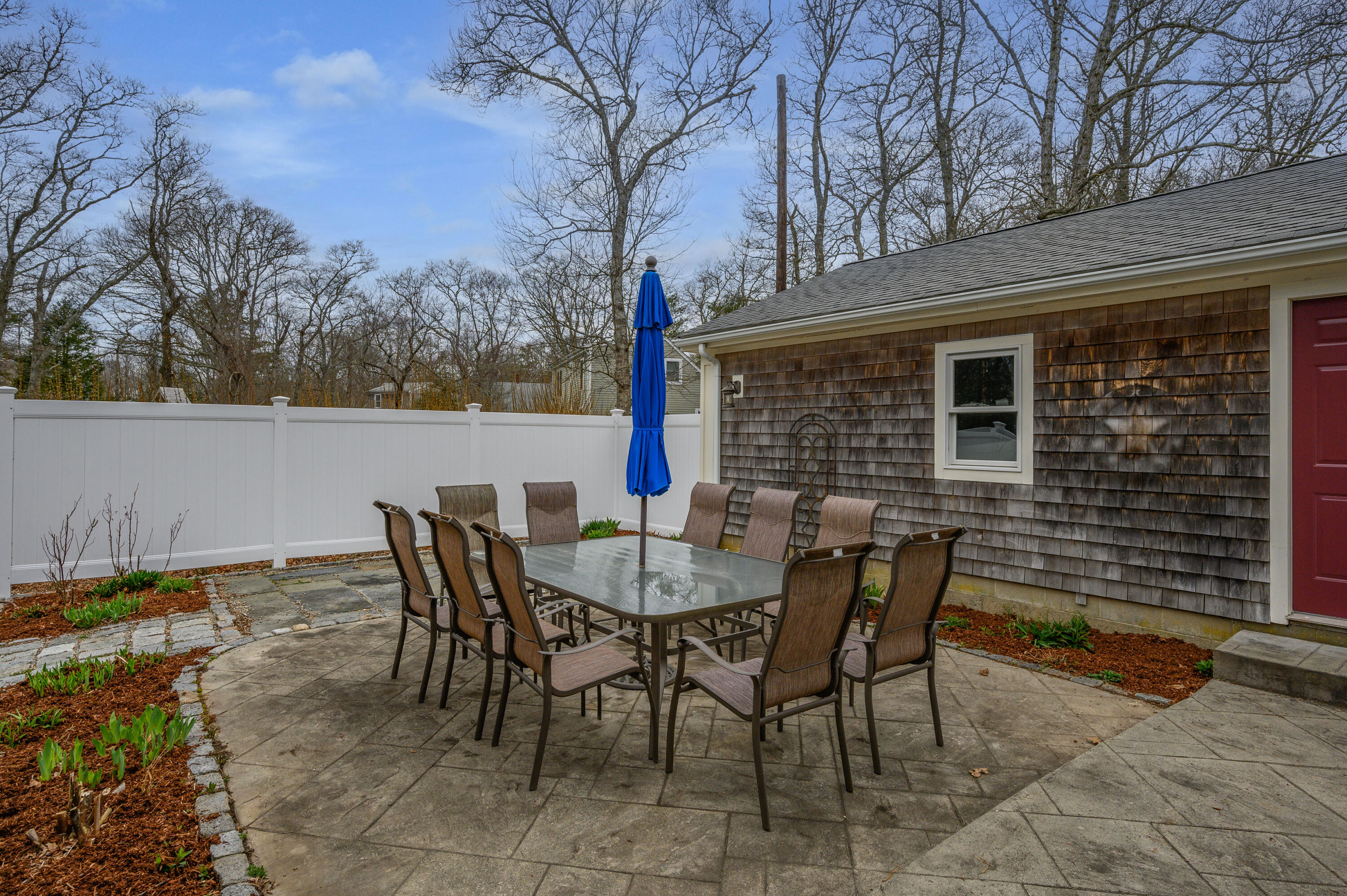 2045 Main Street Marstons Mills, MA 02648 - Photo 5 of 41 Patio and side of garage