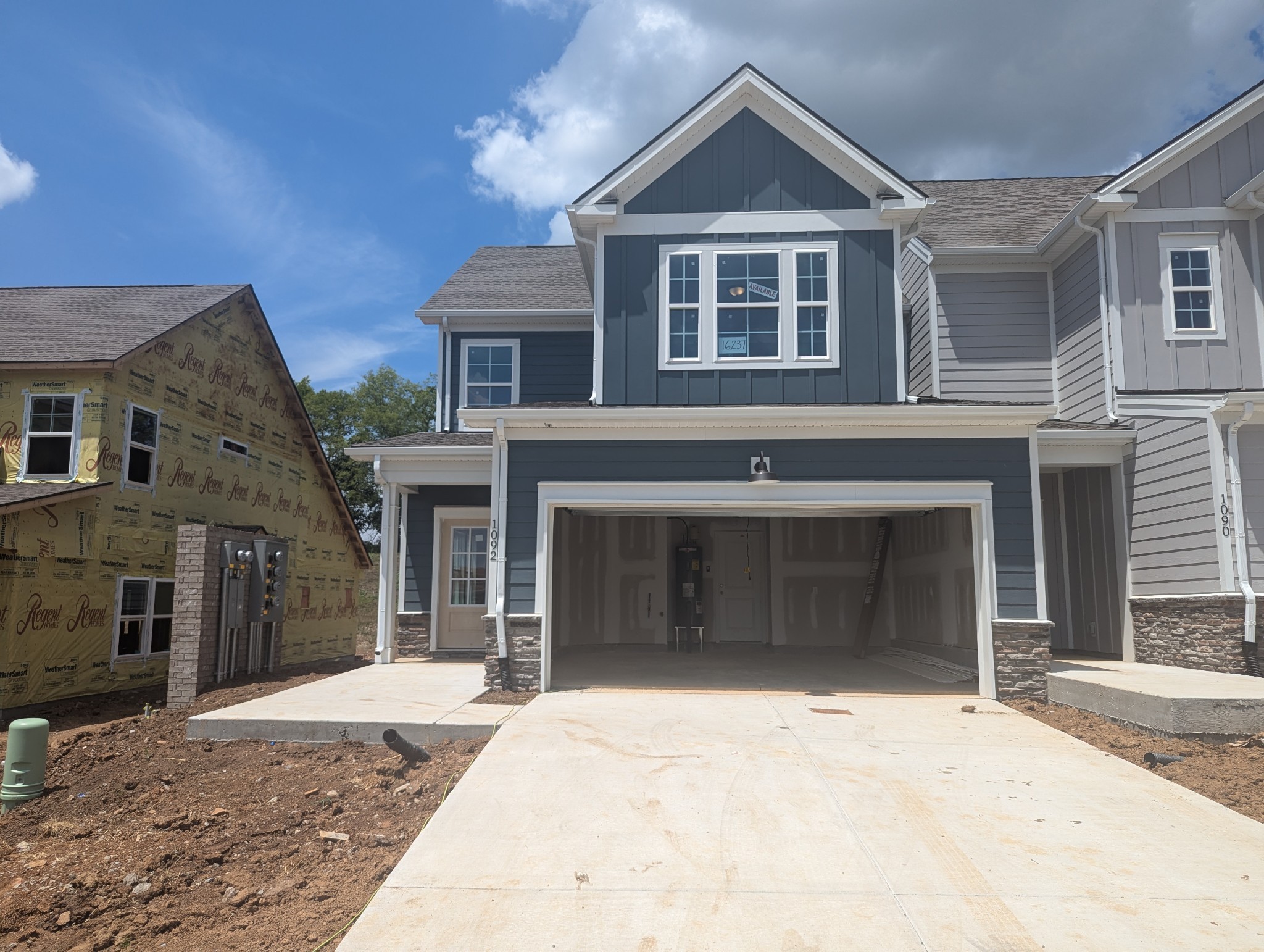 1092 June Wilde Ridge Spring Hill, TN 37174 - Photo 1 of 32 a front view of a house