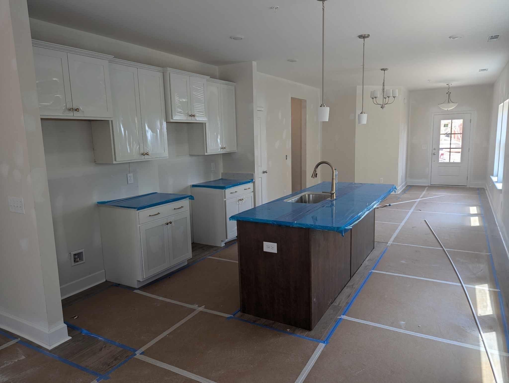 1092 June Wilde Ridge Spring Hill, TN 37174 - Photo 26 of 32 a kitchen with granite countertop a sink a counter space and cabinets
