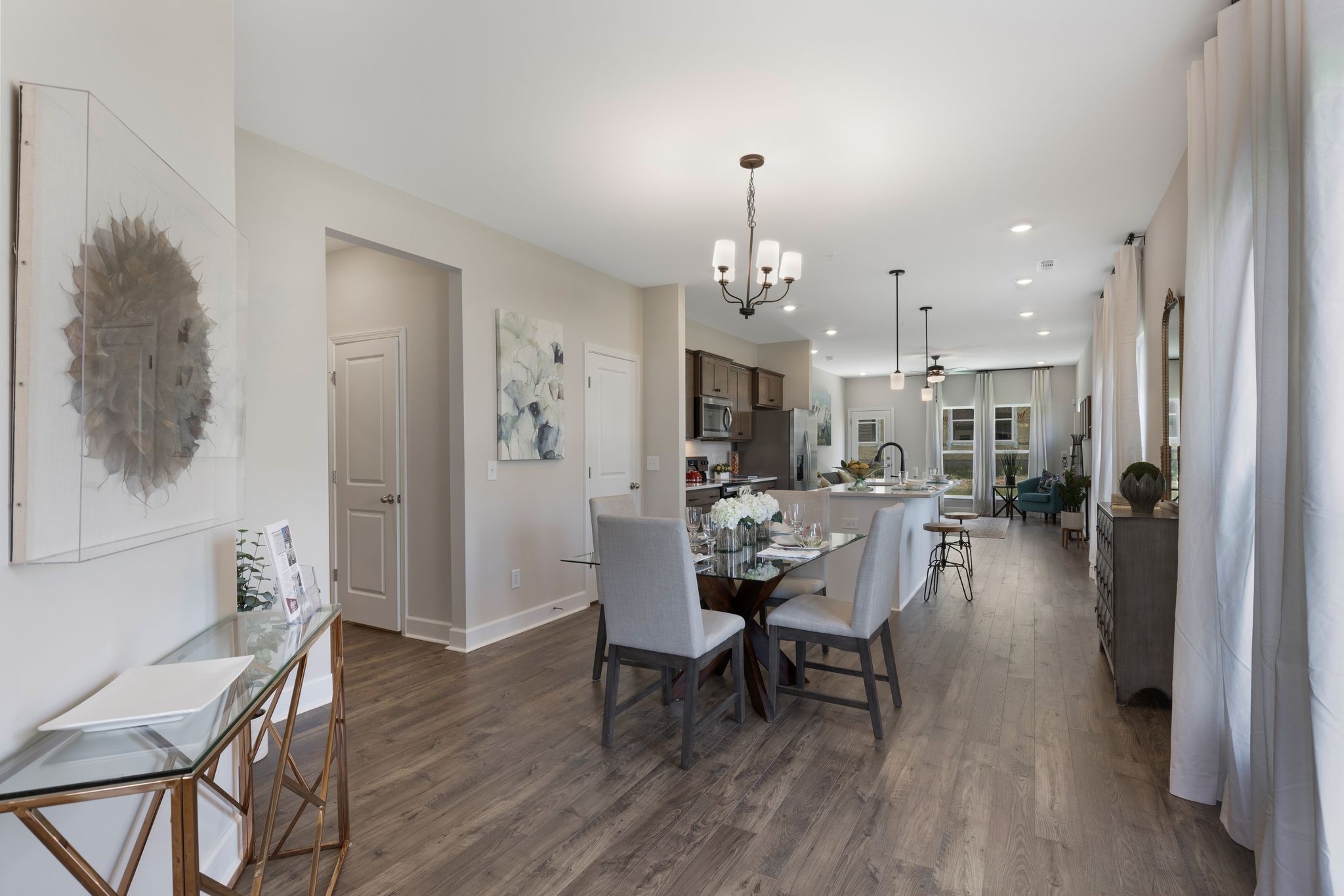 1092 June Wilde Ridge Spring Hill, TN 37174 - Photo 4 of 32 a view of a dining room with furniture and wooden floor