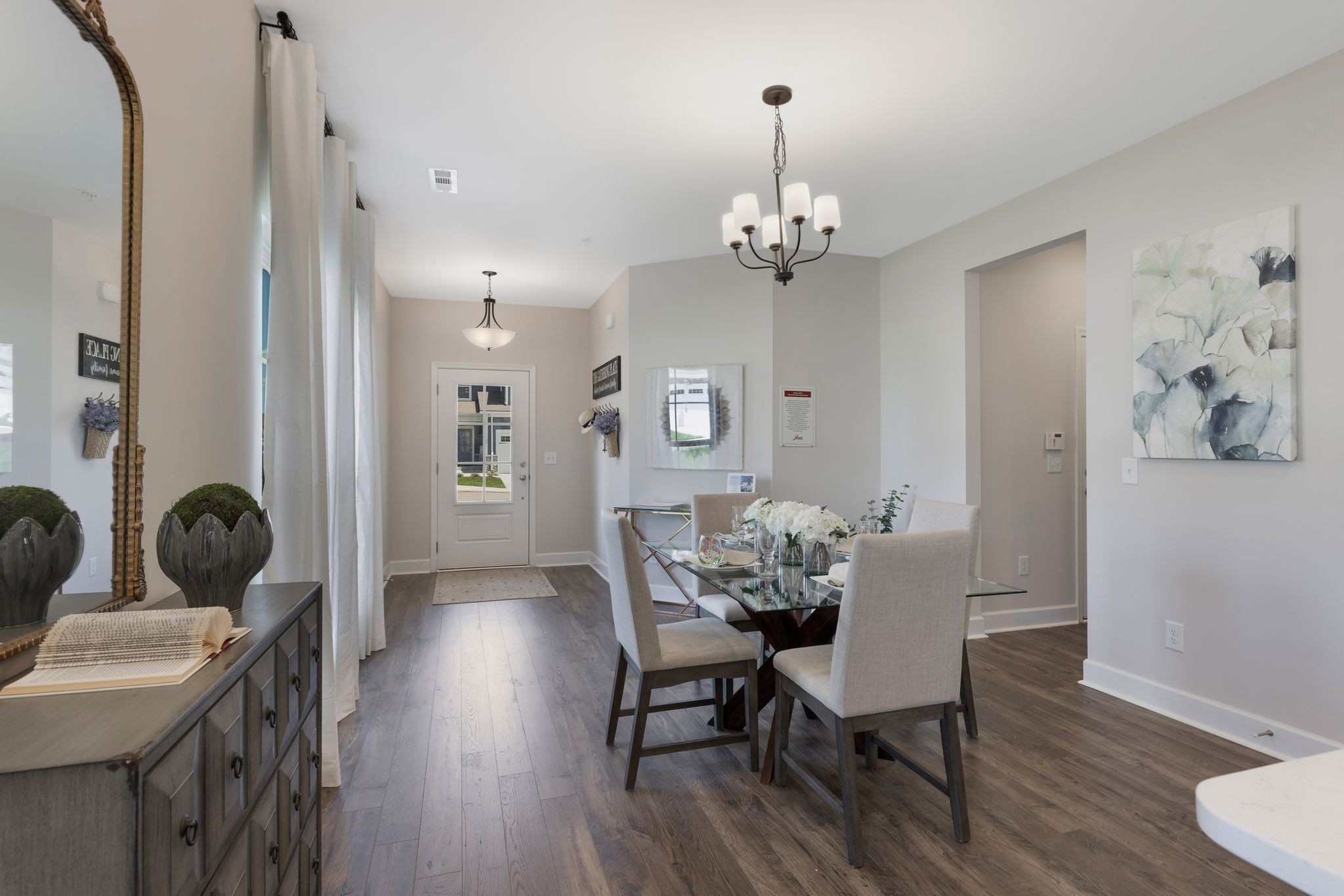 1092 June Wilde Ridge Spring Hill, TN 37174 - Photo 5 of 32 a view of a dining room with furniture and wooden floor