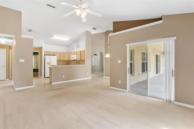 a view of kitchen with cabinets