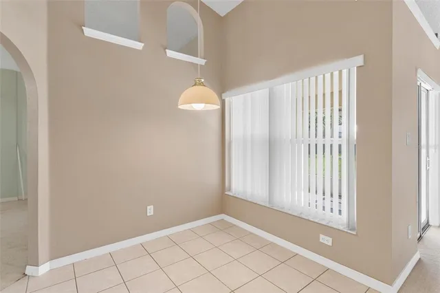 a kitchen with cabinets appliances a sink and a counter top space
