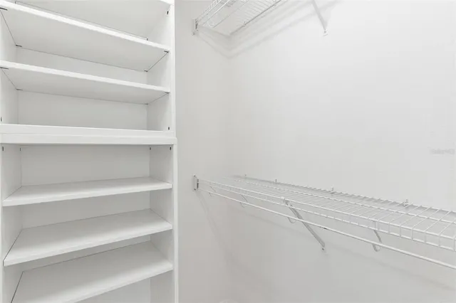 wooden floor with white walls