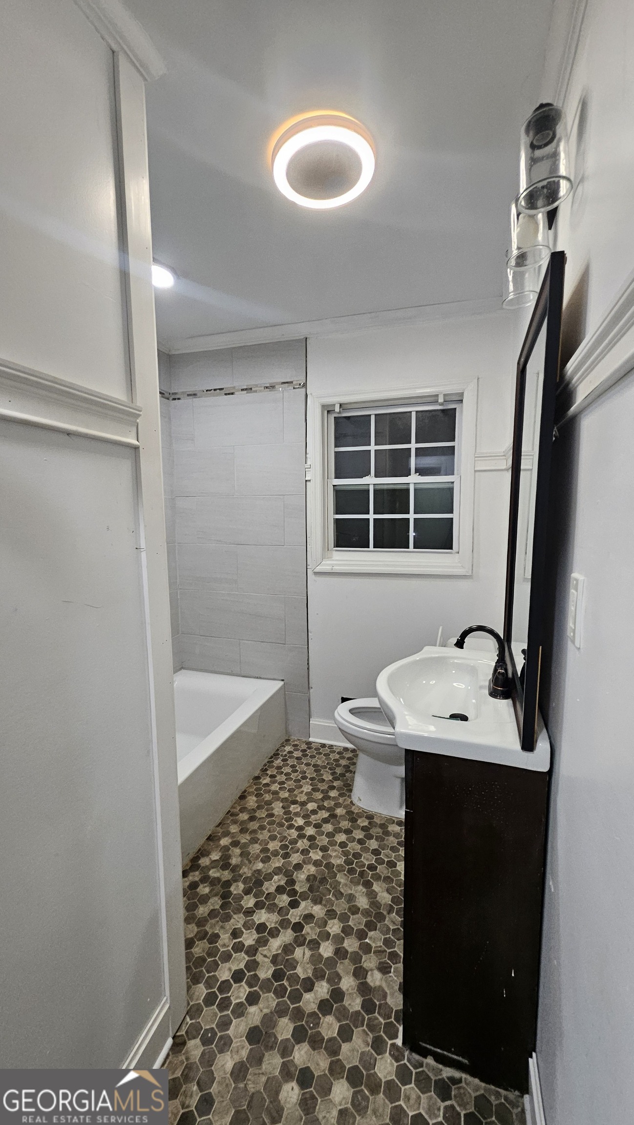 2197 Polar Rock Place Southwest Atlanta, GA 30315 - Photo 7 of 9 a bathroom with a sink toilet and shower