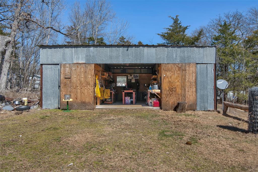 263 Esquire Drive Denison, TX 75021 - Photo 33 of 38 a view of a car garage