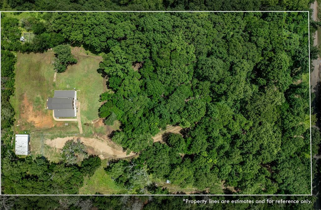 263 Esquire Drive Denison, TX 75021 - Photo 5 of 38 an aerial view of a residential houses with outdoor space and trees