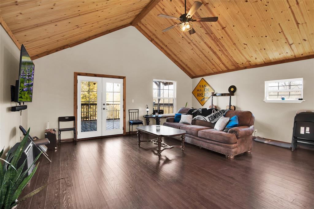263 Esquire Drive Denison, TX 75021 - Photo 9 of 38 a living room with furniture and wooden floor