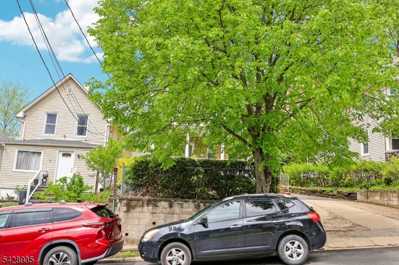50 Preston Street Ridgefield Park, NJ 07660 - Photo 2 of 41 a view of a car parked in front of a house