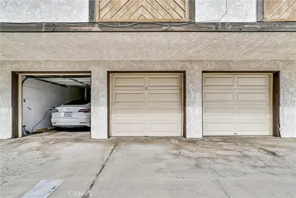 a view of garage with a microwave