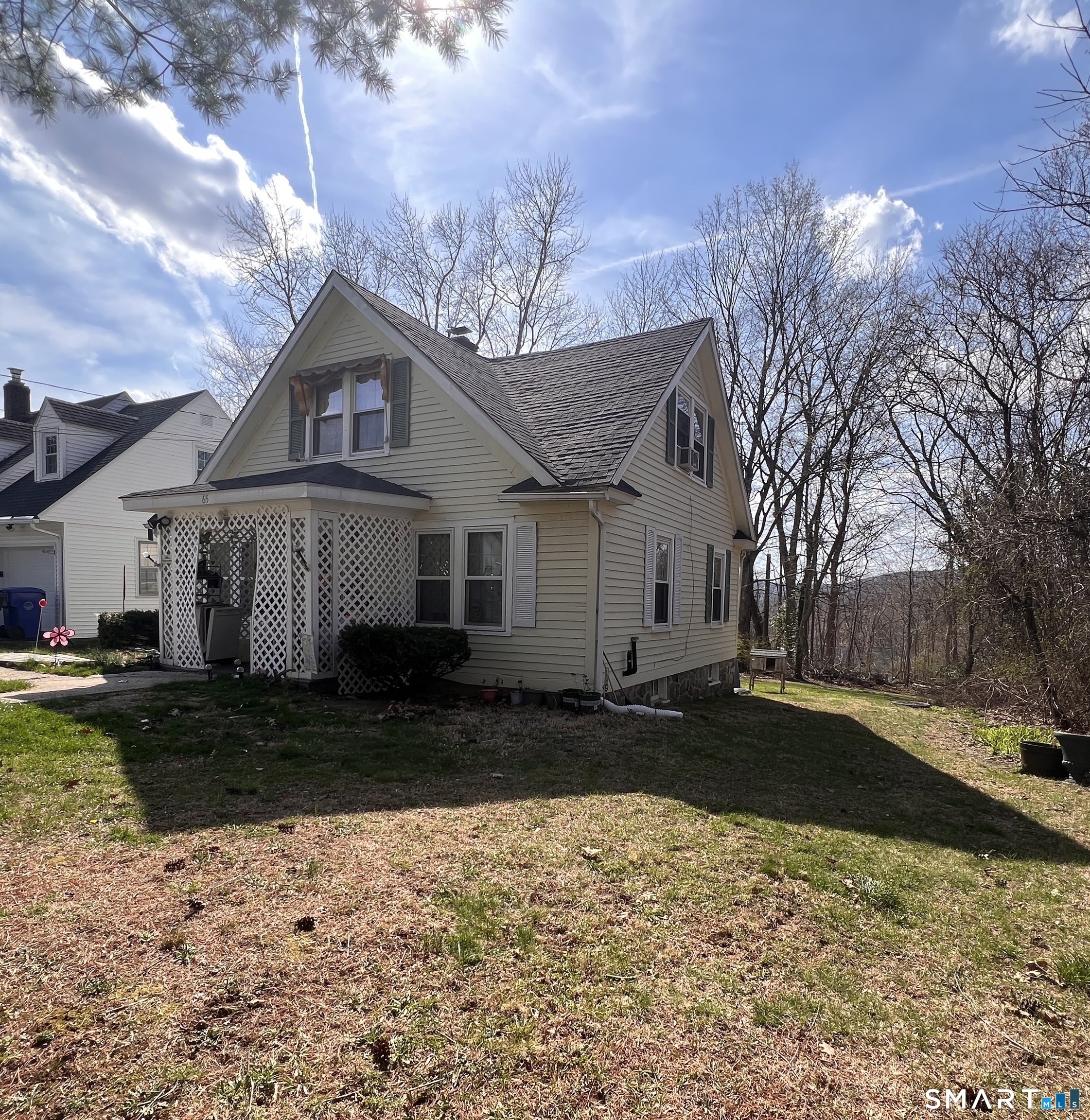 65 Garden Street Torrington, CT 06790 - Photo 5 of 5 a front view of a house with a yard