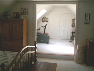 274 Simon Narrows Road Mashpee, MA 02649 - Photo 19 of 28 a bedroom with a bed and a window