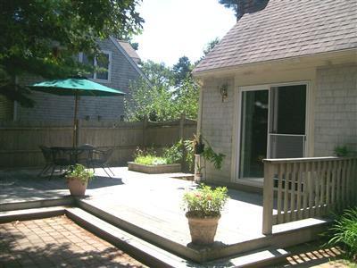 274 Simon Narrows Road Mashpee, MA 02649 - Photo 21 of 28 a front view of a house with a yard