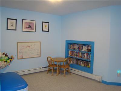 274 Simon Narrows Road Mashpee, MA 02649 - Photo 26 of 28 a view of a workspace with furniture and a bookshelf