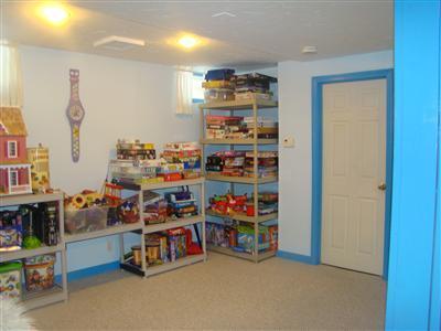274 Simon Narrows Road Mashpee, MA 02649 - Photo 27 of 28 a room with storage and a white refrigerator