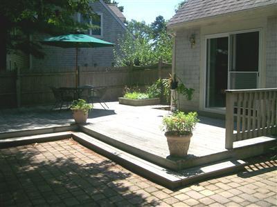 274 Simon Narrows Road Mashpee, MA 02649 - Photo 28 of 28 a view of a porch with a yard