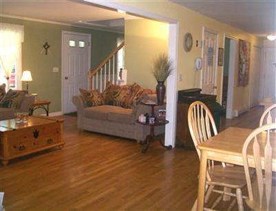 274 Simon Narrows Road Mashpee, MA 02649 - Photo 5 of 28 a living room with furniture and wooden floor
