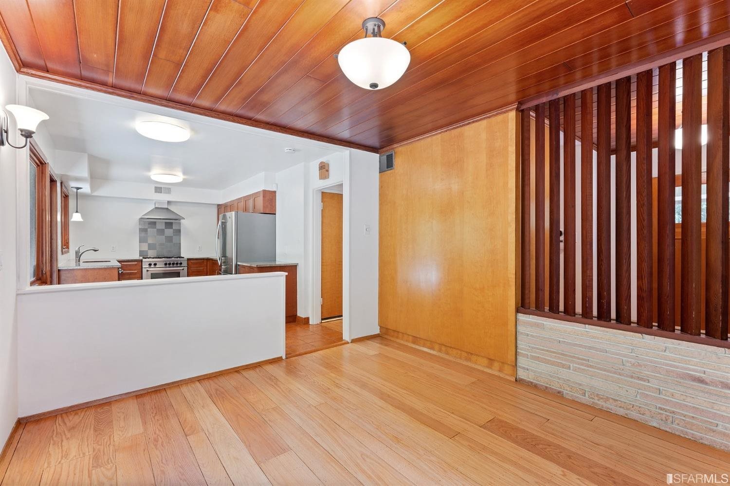 1180 Park Hills Road Berkeley, CA 94708 - Photo 13 of 62 a view of a room with wooden floor and iron gate
