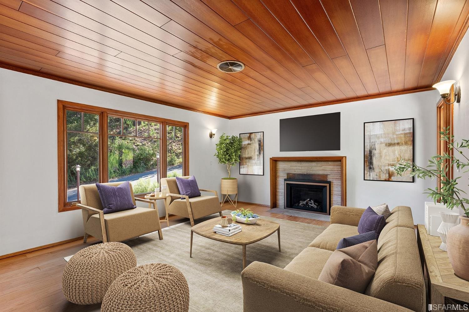 1180 Park Hills Road Berkeley, CA 94708 - Photo 16 of 62 a living room with furniture and a fireplace