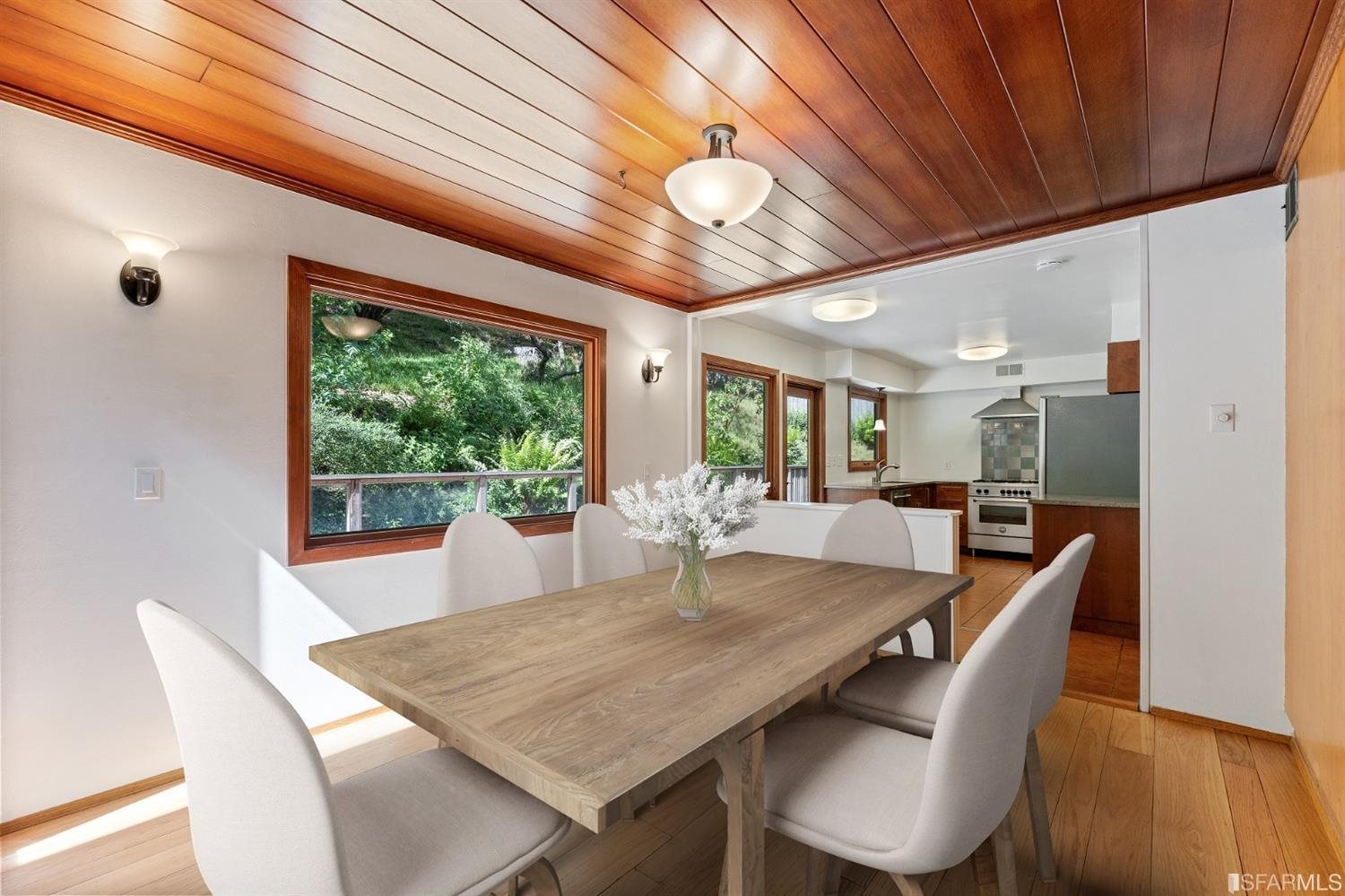 1180 Park Hills Road Berkeley, CA 94708 - Photo 20 of 62 a view of a dining room with furniture window and wooden floor