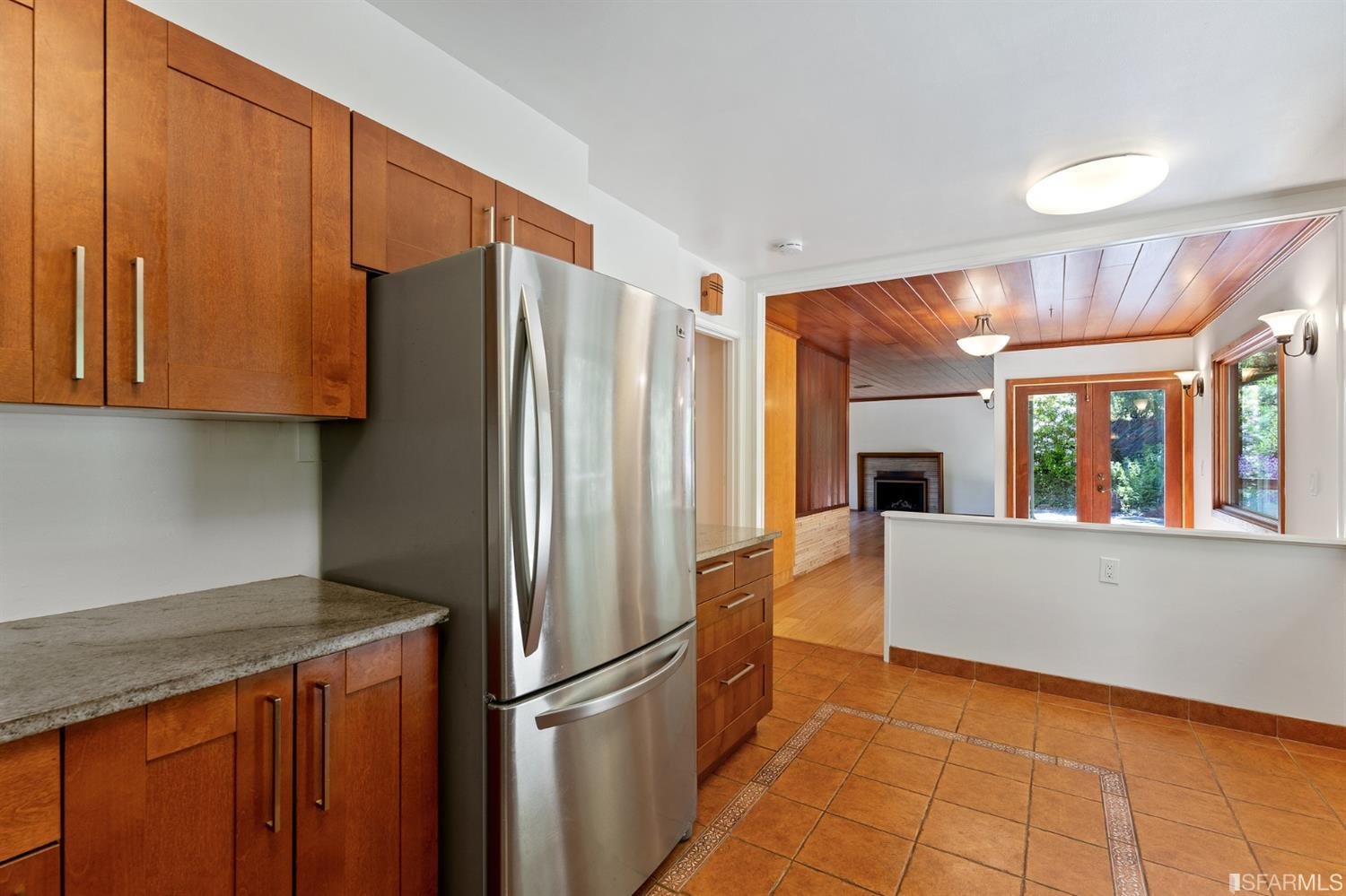 1180 Park Hills Road Berkeley, CA 94708 - Photo 26 of 62 a kitchen with stainless steel appliances granite countertop a refrigerator and a sink