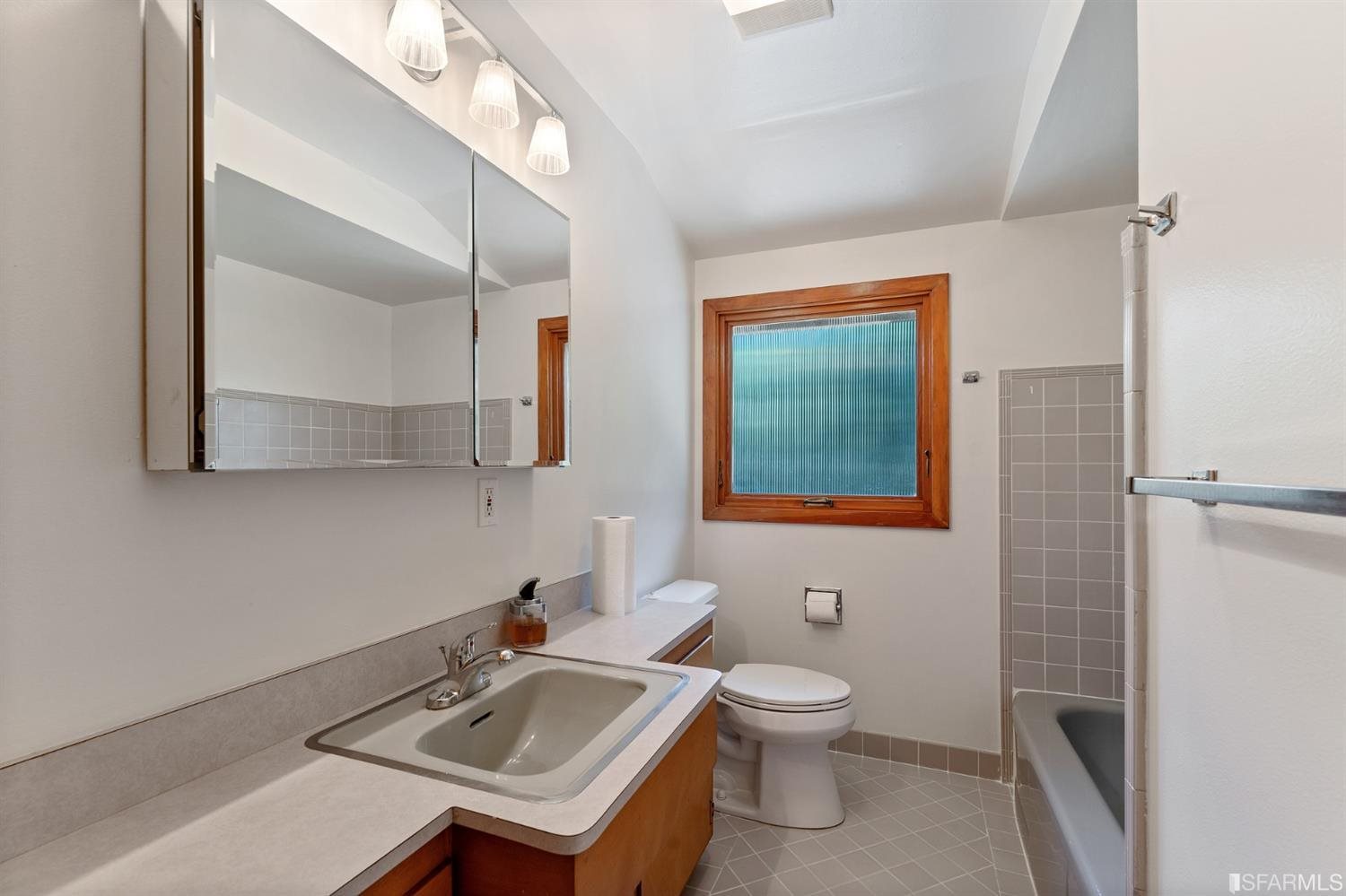 1180 Park Hills Road Berkeley, CA 94708 - Photo 30 of 62 a bathroom with a sink a toilet and mirror