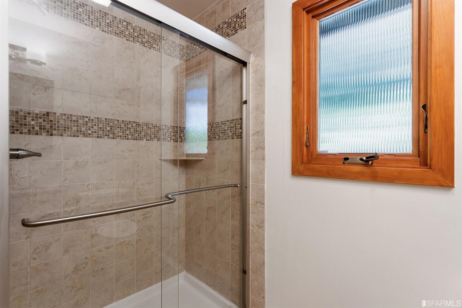 1180 Park Hills Road Berkeley, CA 94708 - Photo 40 of 62 a bathroom with a bathtub and a shower