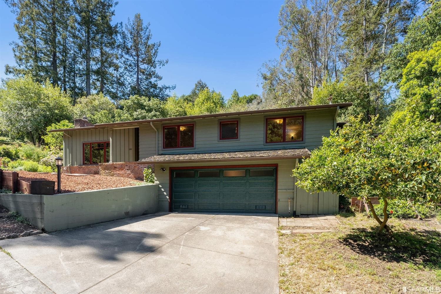 1180 Park Hills Road Berkeley, CA 94708 - Photo 5 of 62 a front view of a house with a yard