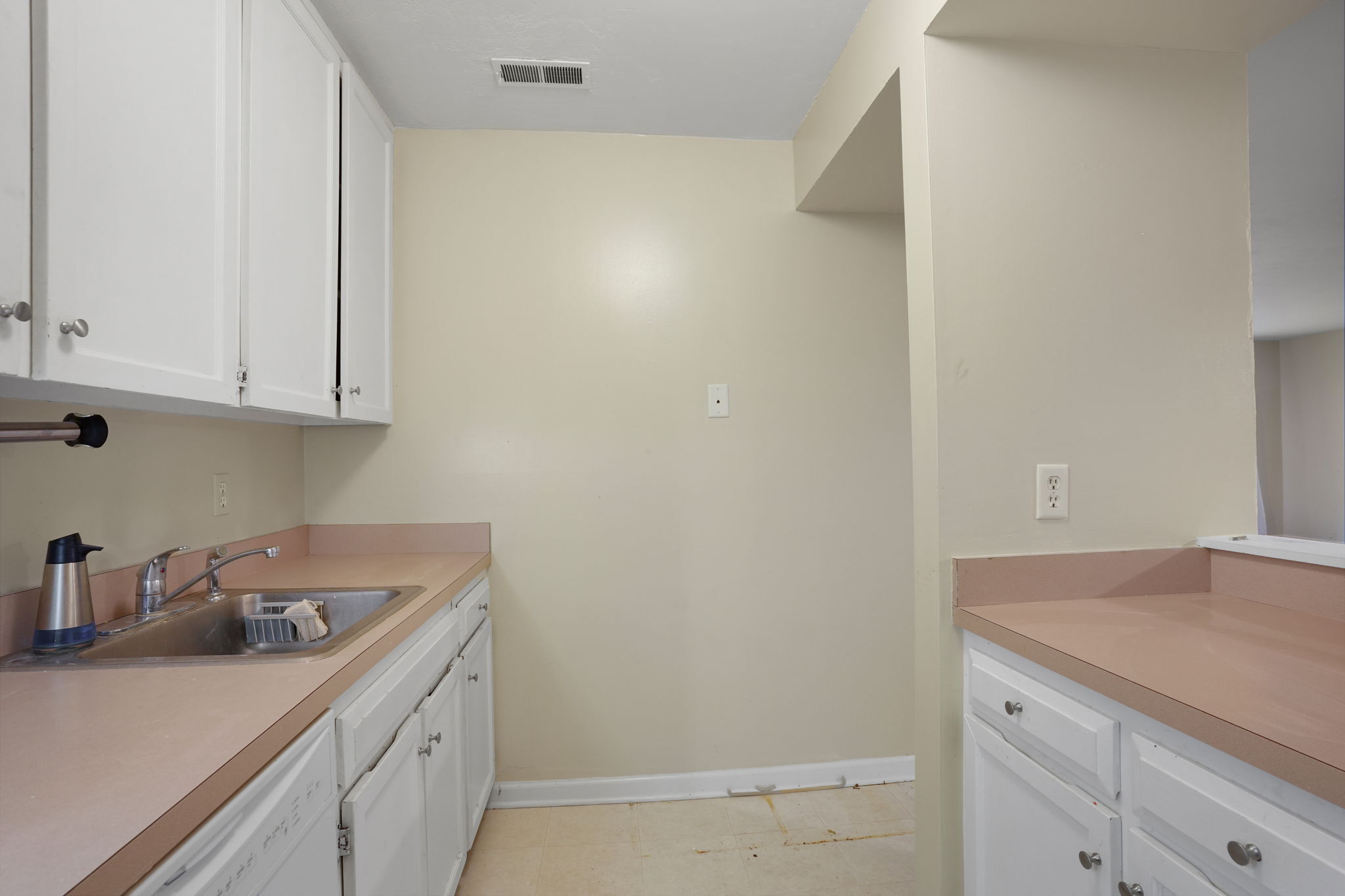 8 Quarry Corner, Unit 8 Ridgefield, CT 06877 - Photo 14 of 28 a kitchen with a sink and cabinets